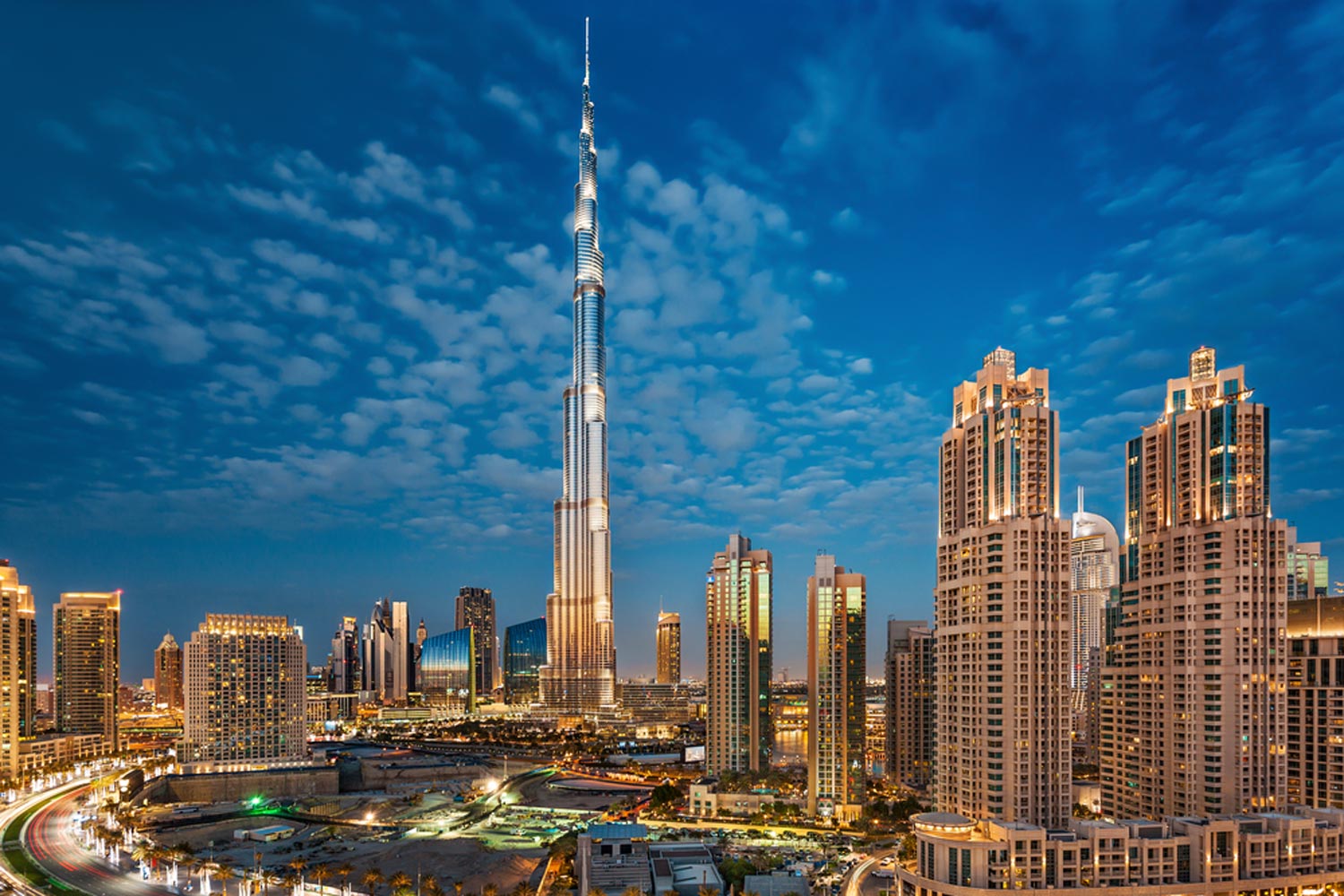 Dubai skyline with waterfront and palm trees